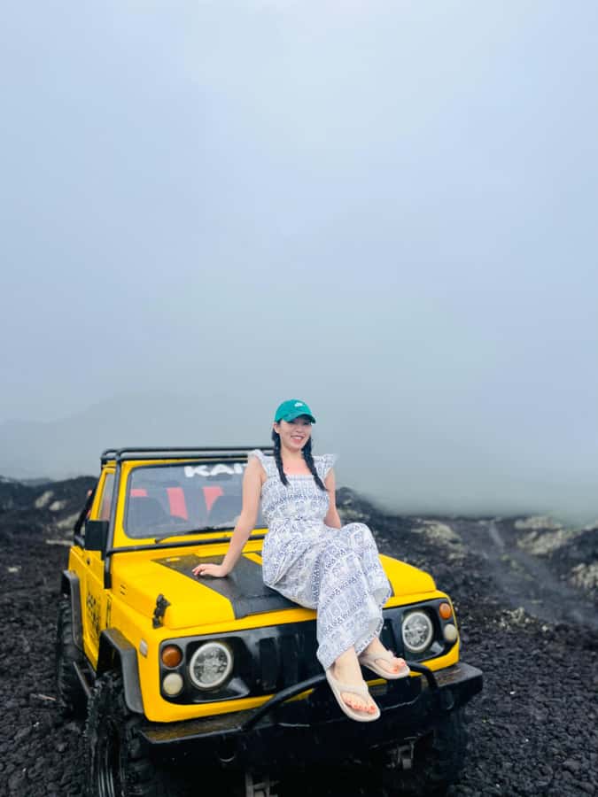 Bali: Day/Sunset Mount Batur 4WD Jeep and Natural Hot Spring - Crossing black lava and farm country
