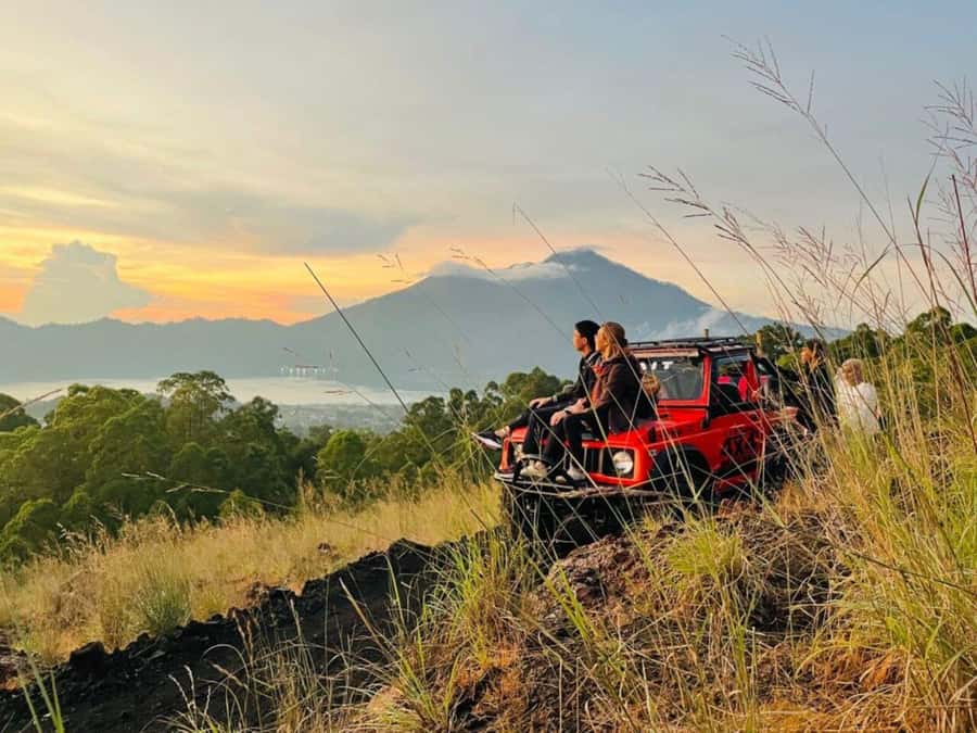 Bali: Mt Batur Jeep Sunrise & Taman Sari Waterfall Tour - Sunrise above Lake Batur