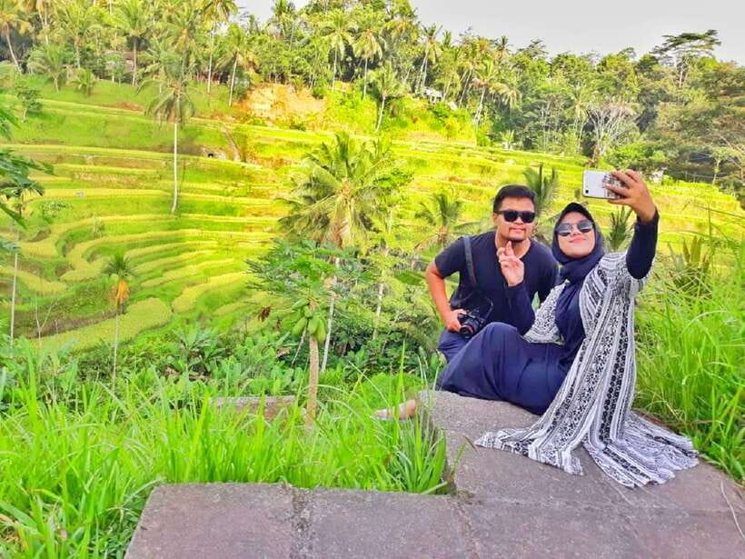 Bali: Rice Terraces, Mount Batur Geopark and more – Day Tour - Tirta Empul asks for respectful attention