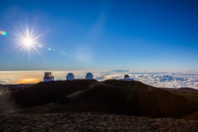 Big Island GOAT Experience: Mauna Kea Summit, Sunset & Stars - The summit sunset above the clouds