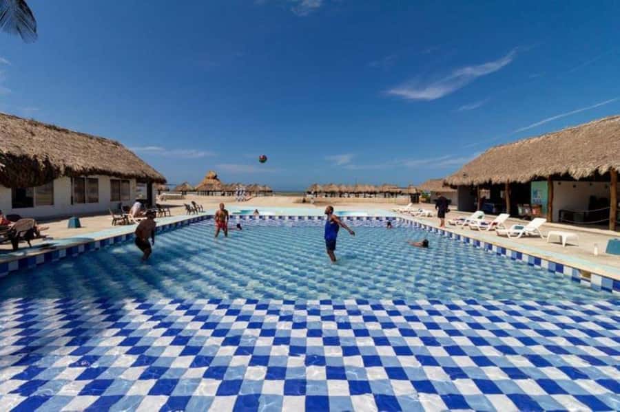 Cartagena: Mud Volcano Tour with Lunch, Pool, and Beach - What guides add to the day