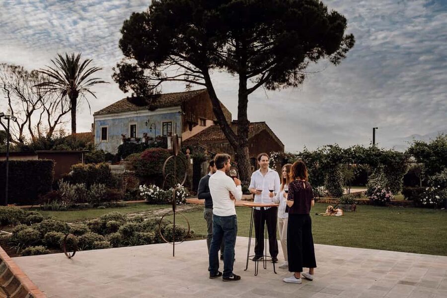 Catania: Etna Urban Winery Sicilian Lunch with Wine Tasting - Walking through the 1790 family winery