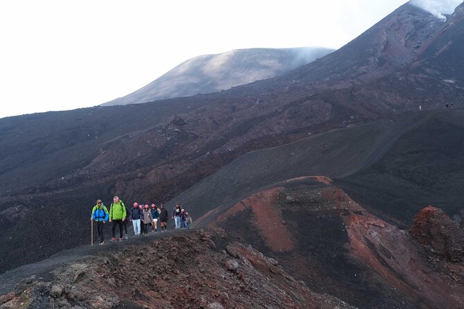 Etna excursion 3000 meters with 4x4 cable car and Trekking - Returning through volcanic sand