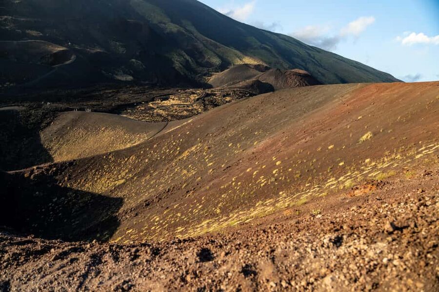 Etna Sunset Tour: Volcano trek, Cave & tasting from Catania - Guide quality is the heart of the experience