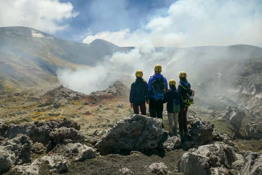 Etna: Trekking to the summit craters at 3340 meters - A fast sandy descent and a high-altitude lunch stop