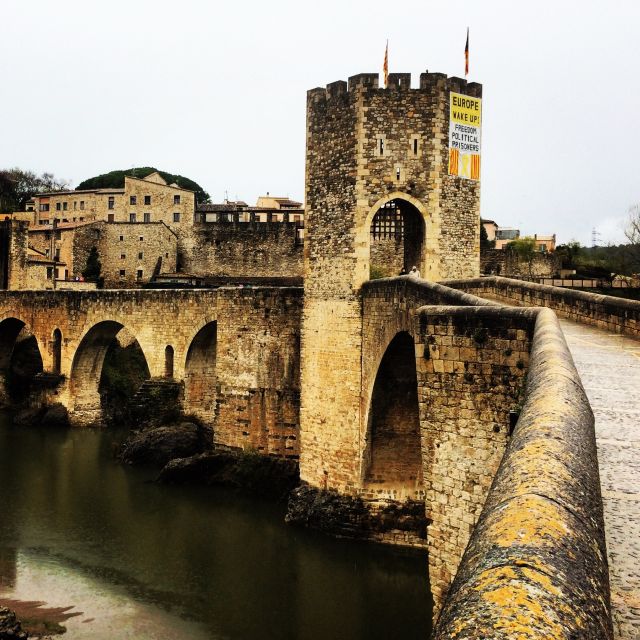 From Barcelona: Medieval Villages and Volcanic Hiking Tour - Sant Joan les Fonts, stonework and a 12th-century bridge