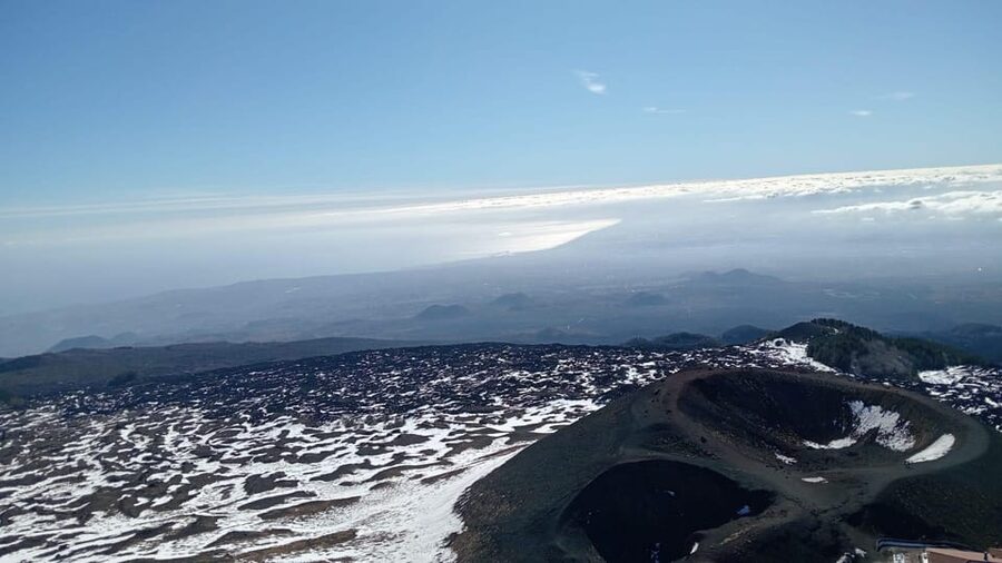 From Catania: Mount Etna Trekking Private Experience - Entering the lava cave with a helmet and torch