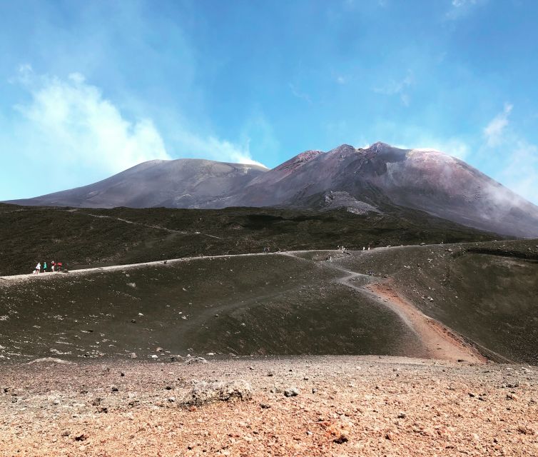 From Taormina: Etna Summit Area, Lunch & Alcantara Tour - Walking through Etnas black craters