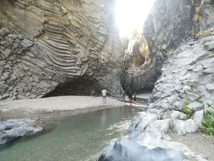From Taormina: Full-Day Etna, Wine & Alcantara Canyons Tour - Entering one of Etna’s lava caves