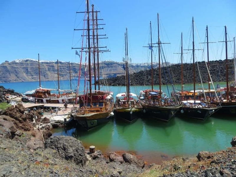From Thera: Thirasia Cruise w/ Volcano Hike and Hot Springs - Walking across the volcanic ground at Nea Kameni