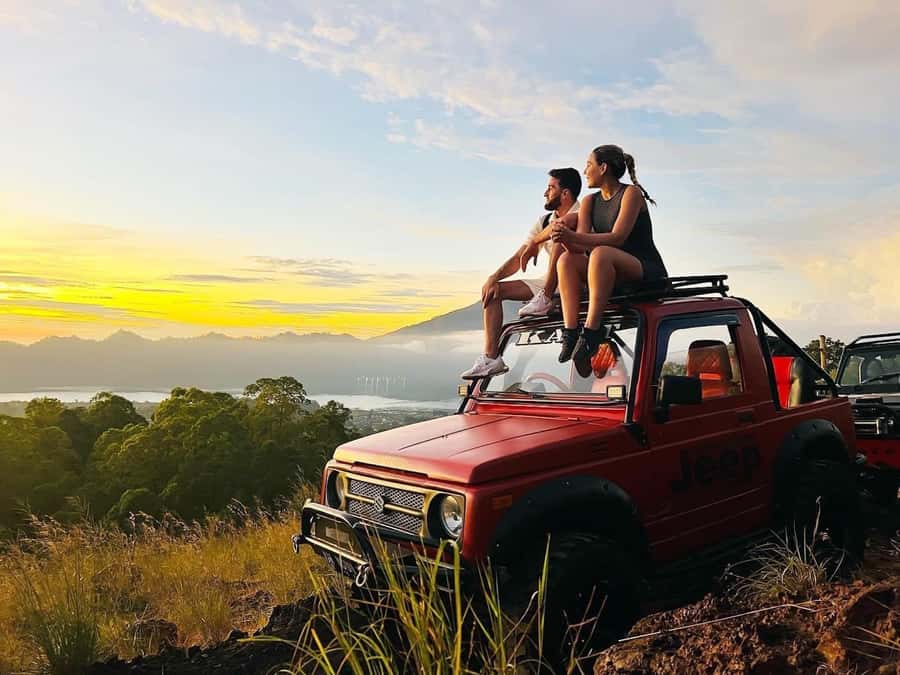 From Ubud: Mount Batur Shared Jeep Sunrise & Hot Spring Tour - Riding the volcanic tracks around Mount Batur