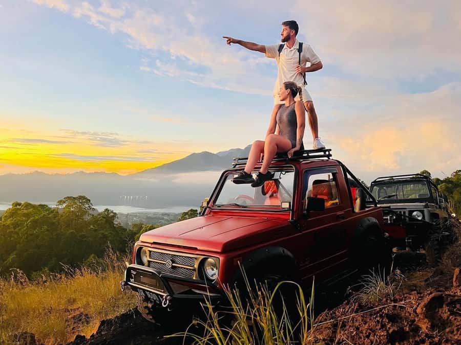 From Ubud: Mount Batur Shared Jeep Sunrise & Hot Spring Tour - Sunrise views over Mount Batur and Lake Batur