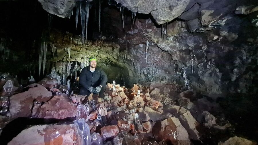Geological Lava Tunnel Adventure - Arnarker Cave - Going underground over boulders