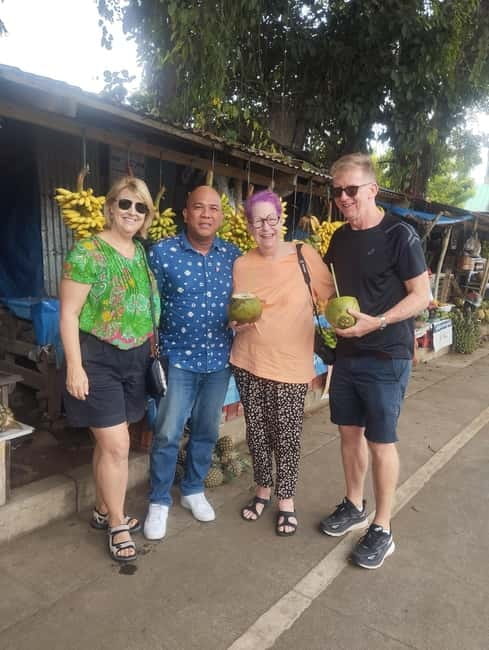 Manila: Private Tagaytay Highlands and Taal Volcano Tour - Fruit stalls, local sweets, and roadside flavor