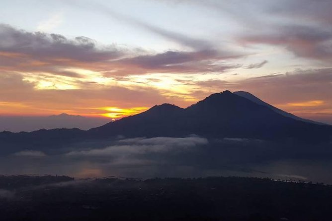 Mt Batur Sunrise, Breakfast & Natural Hot Springs - Descending through rough volcanic terrain