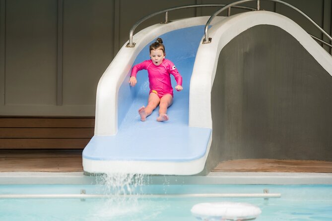 Polynesian Spa Rotorua: Family Hot Pools and Freshwater Pool - The mini hydro slide keeps children busy