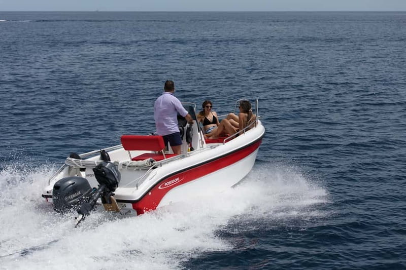 Private License-Free Boat Trip – Santorini Coast & Caldera - Taking the controls without a boating license