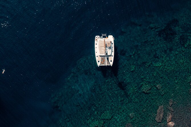 Romantic Sunset Catamaran Caldera Cruise incl. Meal & Drinks - Pickup, boarding, and the question of where the boat starts