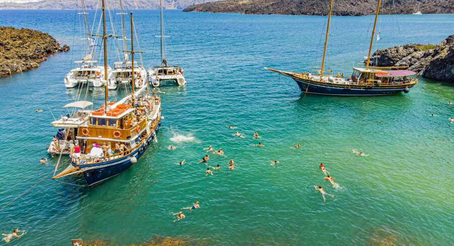 Santorini 2-Day Combo: Volcano Boat Cruise & Island Bus Tour - Oia sunset, with one practical catch