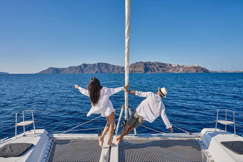 Santorini: Caldera Classic Catamaran Cruise w/ Meal & Drinks - Red Beach: a dramatic first swim