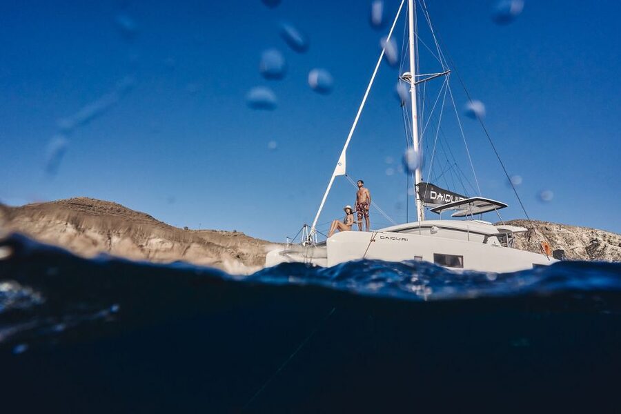 Santorini: Caldera Luxury Catamaran Cruise w/ Meal & Drinks - From your hotel to Vlichada Marina