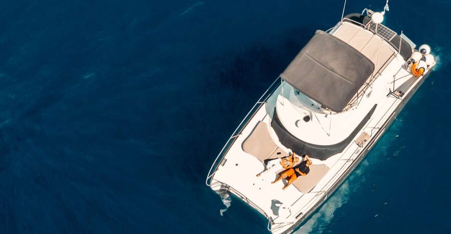 Santorini: Caldera Private Power Catamaran Cruise - Thirassia, the quiet first stop