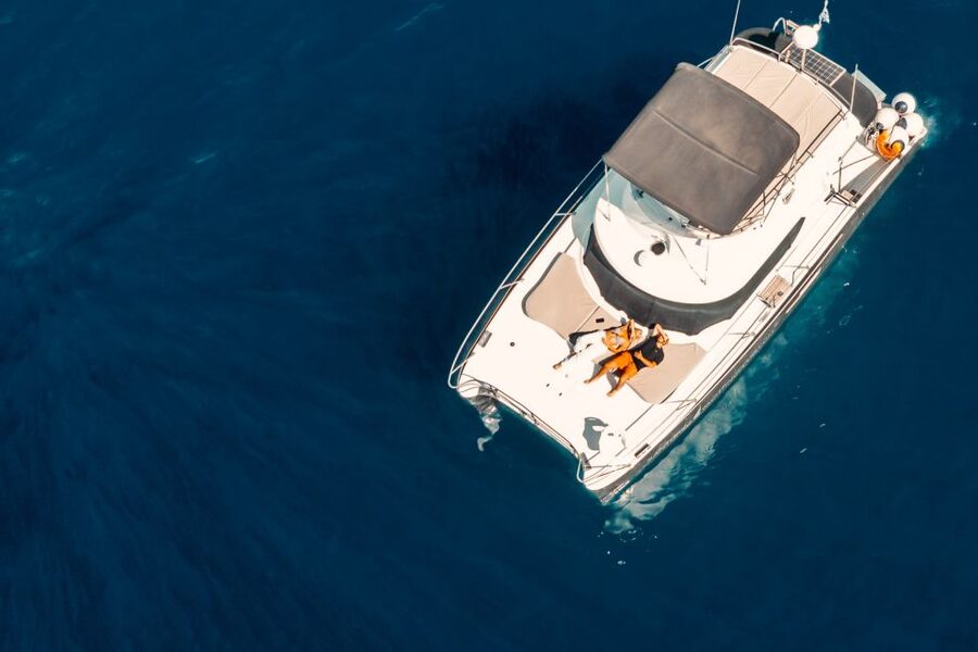 Santorini: Caldera Private Power Catamaran Cruise - White Beach, Red Beach, and the caldera coast