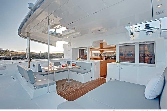 Santorini Caldera Sailing Tour with BBQ Lunch and Drinks - Red Beach and the colored coast