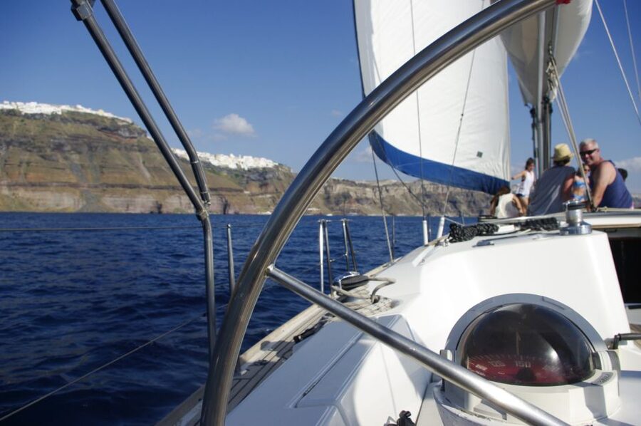 Santorini Caldera: Sunset Sailing Cruise with Meal - Mesa Pigadia and the first swim