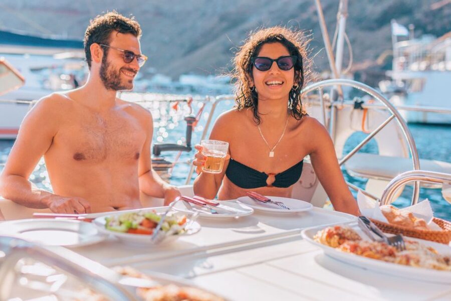 Santorini Caldera: Sunset Sailing Cruise with Meal - Palea Kameni and the warm volcanic water