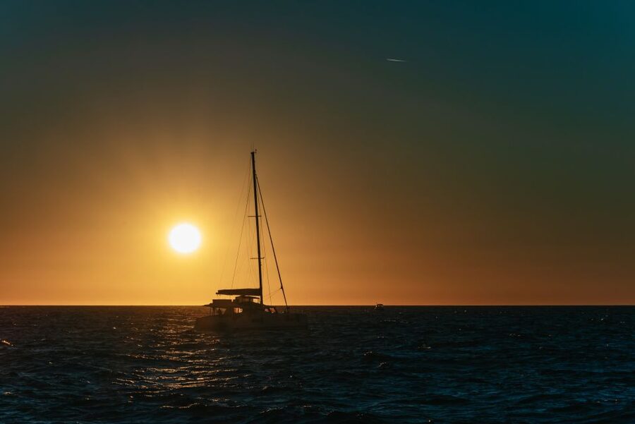 Santorini: Catamaran Caldera Cruise with Meal and Drinks - The catamaran, crew, and group size