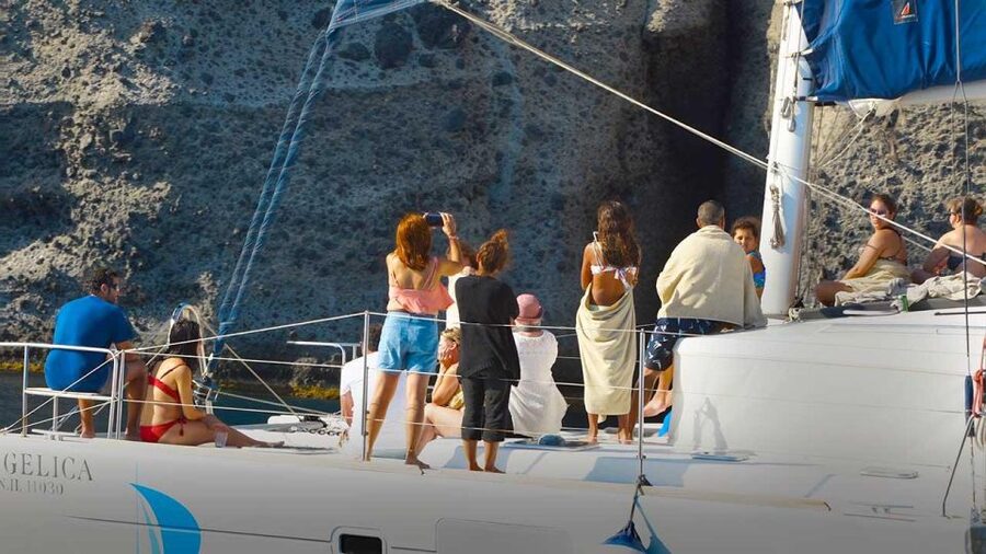 Santorini: Luxury Caldera Cruise with Full Greek Meal - Setting out from Santorini’s cliff villages