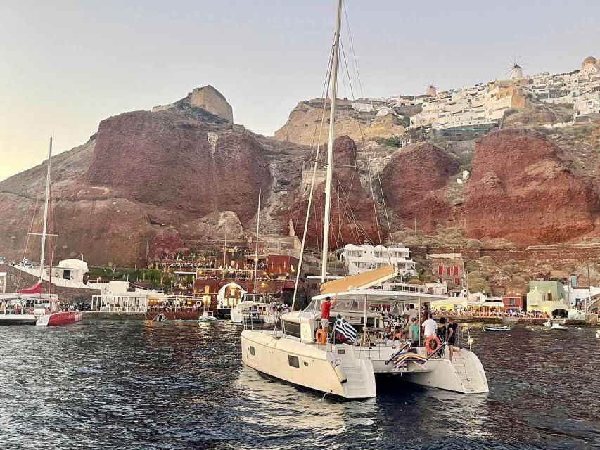 Santorini: Luxury Caldera Cruise with Full Greek Meal - Red Beach and the southern coast