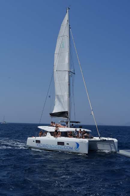 Santorini: Luxury Caldera Cruise With Meal & Drinks - Pickup and the first stretch at sea
