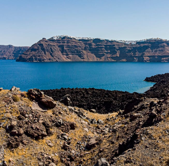 Santorini Port: 3 Hour Cruise to Volcano and Hot Springs - Sailing across the Santorini caldera
