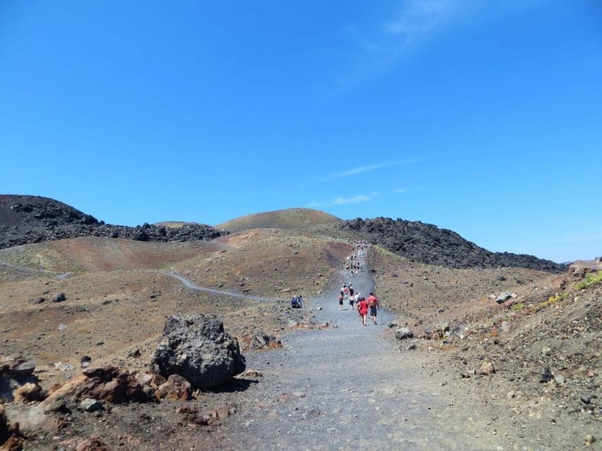 Santorini Port: Cruise to Volcano, Hot Springs & Thirassia - Walking across Nea Kameni’s volcanic ground