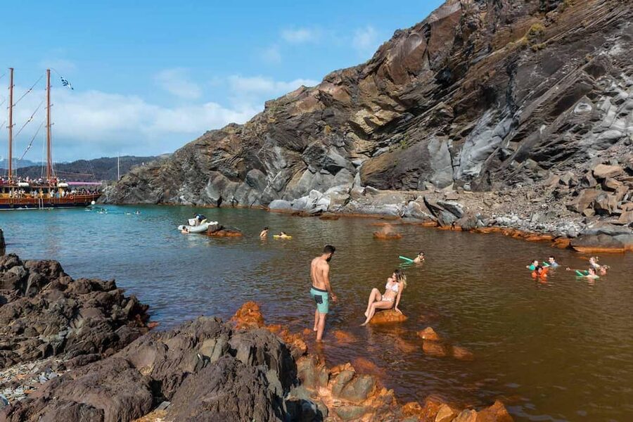 Santorini Port: Cruise to Volcano, Hot Springs & Thirassia - The long return past Oia and Fira