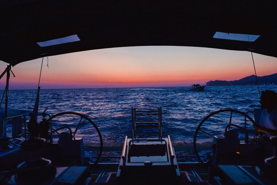 Santorini: Private Caldera Sailing Trip with Open Bar & Meal - White Beach for photographs and swimming