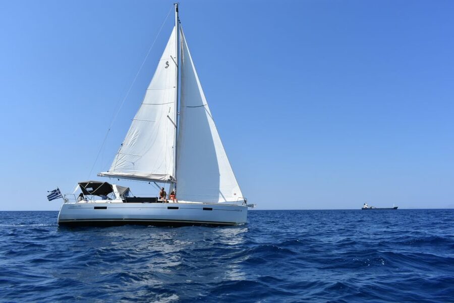 Santorini: Private Caldera Sailing Trip with Open Bar & Meal - Black Mountain and the hidden coves