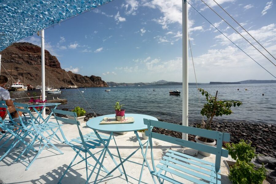 Santorini: Volcanic Islands Cruise with Hot Springs Visit - Sailing the caldera on a wooden boat