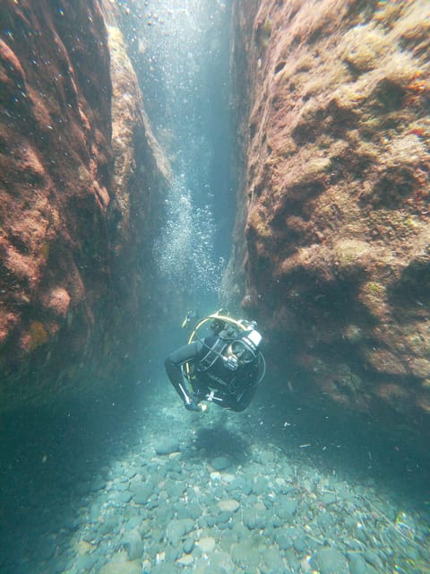 Scuba Diving in the Volcanic Caldera/shorelines of Santorini - A calm morning for certified scuba divers