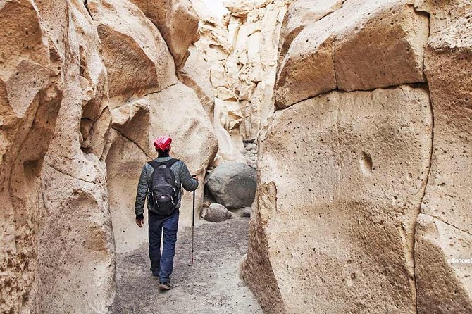 Sillar Route in Arequipa and viewpoint of the Volcanoes - Añashuayco quarry: stonecutting, murals, and working hands