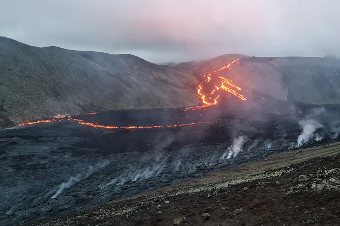 Small Group Volcano Hike with a Professional Geologist - The crater viewpoint and the lava field below