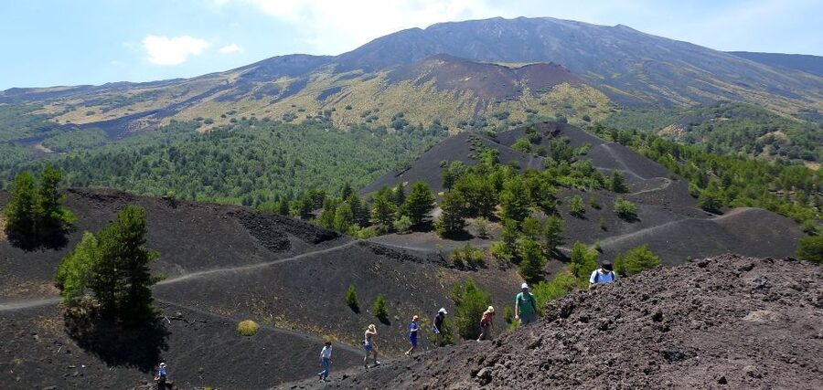 Taormina and Catania: Private Etna Exploration and Cave Tour - Walking to an Etna lateral crater