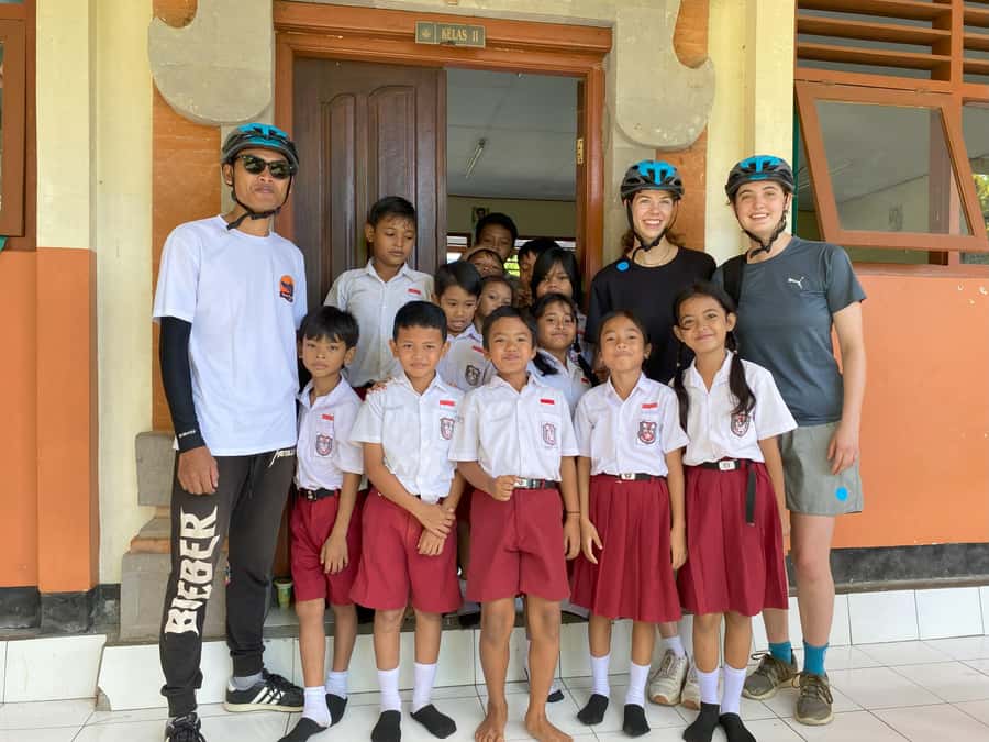 Ubud: Downhill Bike Tour with Rice Fields, Volcano and Meal - Temple traditions along the route